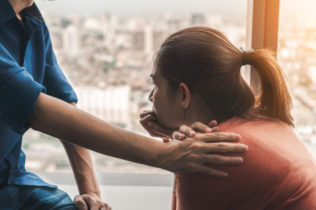 Woman receiving help ending a co-dependent relationship