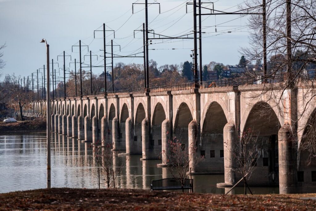 daytime shot of bridge and power lines near cumberland pa