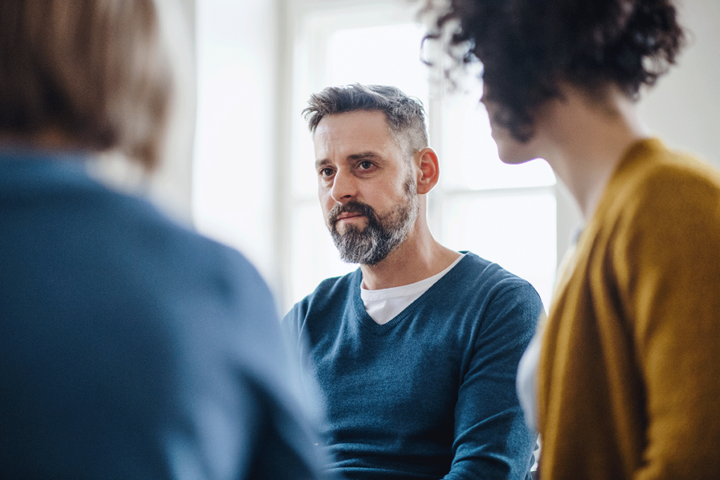 a man participates in group therapy during heron addiction treatment in west chester pa