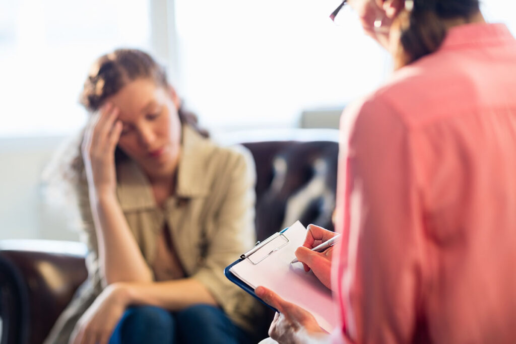 a therapist helping Mental health pennsylvania talks to a person
