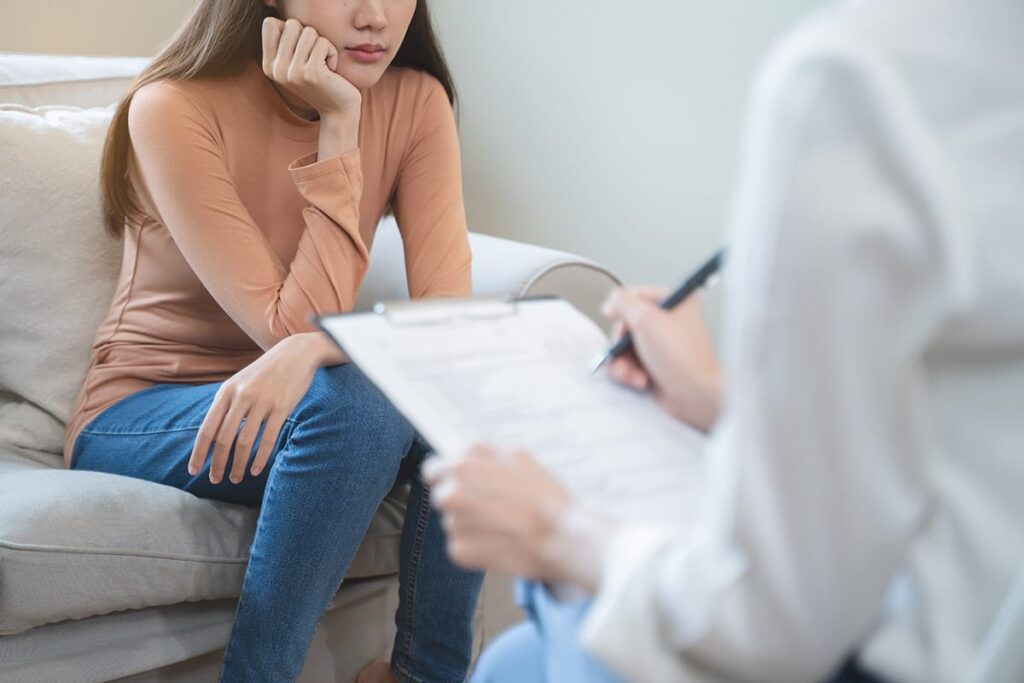 A person in therapy learns about dialectical behavior therapy benefits
