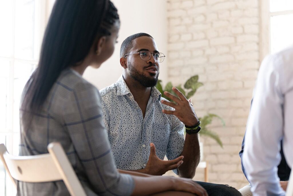 people participate in therapy during a detox program for drugs
