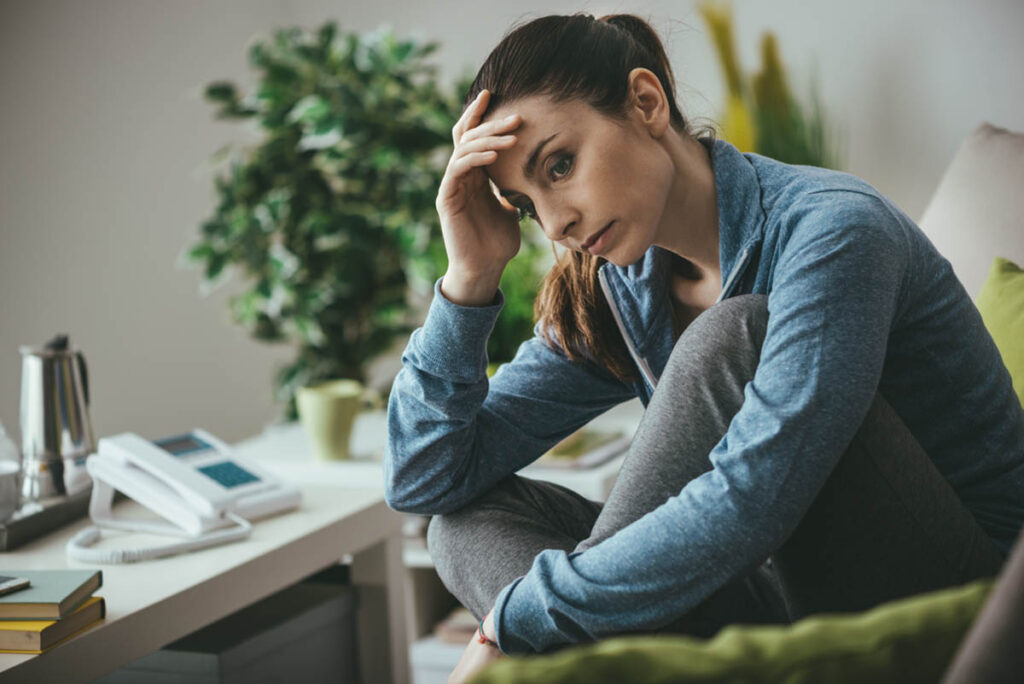 a person sits and wonders why do people get addicted to painkillers