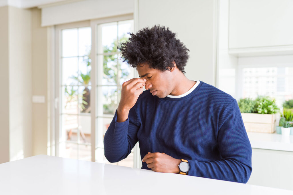 Man experiencing signs of opioid withdrawal