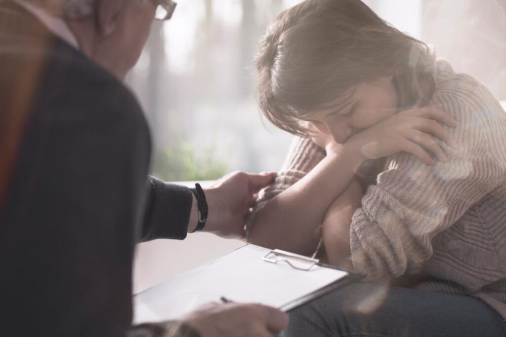 A person experiencing both trauma and addiction