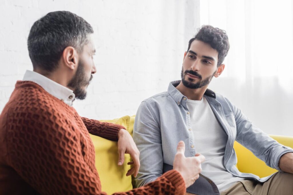 counselor and patient on couch during session explaining what is dual diagnosis