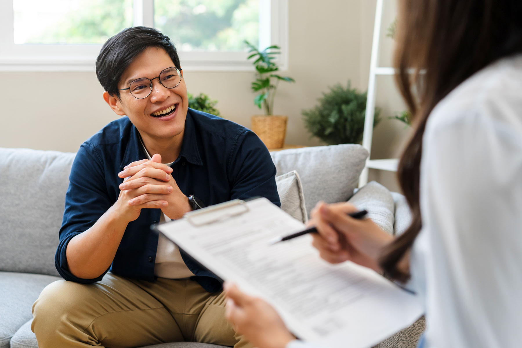A man is enjoying a session with an addiction aftercare therapist while in the aftercare program in Mechanicsburg, PA.