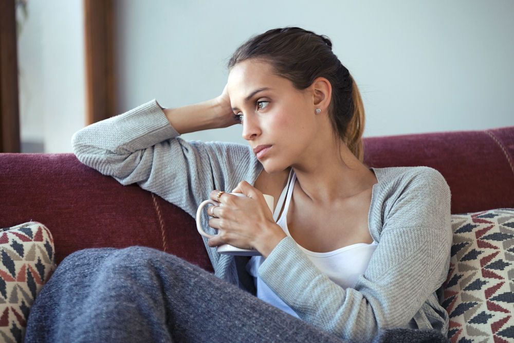 a-woman-staring-out-depressed