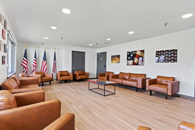 Veterans group therapy lounge at drug and alcohol rehab center